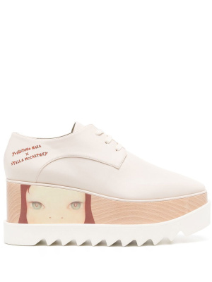 X Yoshitomo Nara printed platform sneakers, Stella McCartney X Yoshitomo Nara printed platform sneakers
X Yoshitomo Nara printed platform sneakers, Stella McCartney X Yoshitomo Nara printed platform sneakers