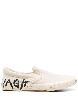 Paris graffiti-print slip-on sneakers, Balenciaga Paris graffiti-print slip-on sneakers
Paris graffiti-print slip-on sneakers, Balenciaga Paris graffiti-print slip-on sneakers