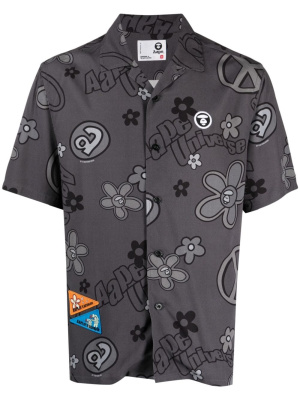 Graphic-print short-sleeved shirt, AAPE BY *A BATHING APE® Graphic-print short-sleeved shirt
Graphic-print short-sleeved shirt, AAPE BY *A BATHING APE® Graphic-print short-sleeved shirt
