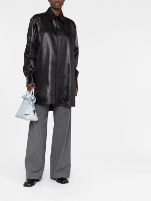 Faux-leather long-sleeved shirt, Maison Margiela Faux-leather long-sleeved shirt
Faux-leather long-sleeved shirt, Maison Margiela Faux-leather long-sleeved shirt
