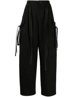 High-waisted strapped cargo trousers, Yohji Yamamoto High-waisted strapped cargo trousers
High-waisted strapped cargo trousers, Yohji Yamamoto High-waisted strapped cargo trousers