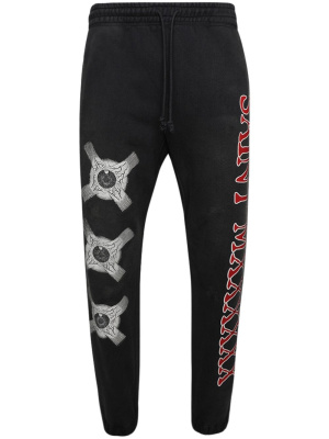 Eyeball graphic-print track pants, SAINT MXXXXXX Eyeball graphic-print track pants
Eyeball graphic-print track pants, SAINT MXXXXXX Eyeball graphic-print track pants