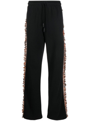 Fringed-trim track pants, Marcelo Burlon County of Milan Fringed-trim track pants
Fringed-trim track pants, Marcelo Burlon County of Milan Fringed-trim track pants