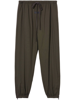 Tapered-leg drop crotch trousers, FEAR OF GOD ESSENTIALS Tapered-leg drop crotch trousers
Tapered-leg drop crotch trousers, FEAR OF GOD ESSENTIALS Tapered-leg drop crotch trousers