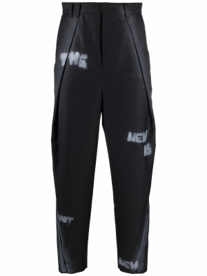 Slogan print straight-leg trousers, Ader Error Slogan print straight-leg trousers
Slogan print straight-leg trousers, Ader Error Slogan print straight-leg trousers