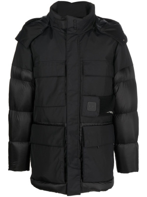 Four-pocket hooded padded jacket, C.P. Company Four-pocket hooded padded jacket
Four-pocket hooded padded jacket, C.P. Company Four-pocket hooded padded jacket