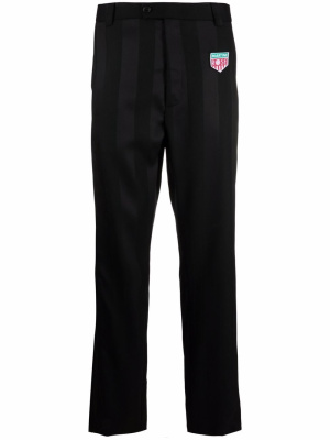 Appliqué-patch tailored trousers, Martine Rose Appliqué-patch tailored trousers
Appliqué-patch tailored trousers, Martine Rose Appliqué-patch tailored trousers