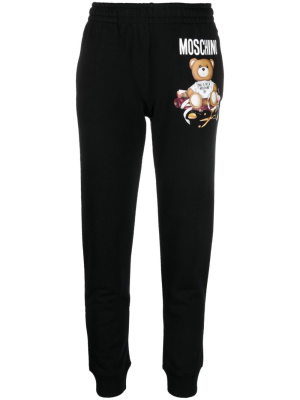 Teddy bear-print organic cotton track pants, Moschino Teddy bear-print organic cotton track pants
Teddy bear-print organic cotton track pants, Moschino Teddy bear-print organic cotton track pants