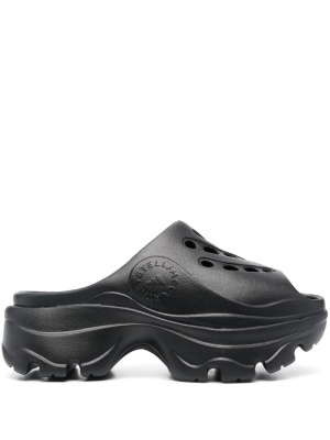 Logo-embossed perforated clogs, Adidas by Stella McCartney Logo-embossed perforated clogs
Logo-embossed perforated clogs, Adidas by Stella McCartney Logo-embossed perforated clogs
