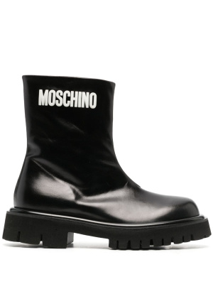 Embossed-logo zipped leather boots, Moschino Embossed-logo zipped leather boots
Embossed-logo zipped leather boots, Moschino Embossed-logo zipped leather boots