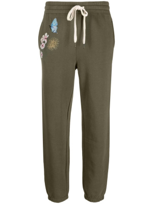 Floral-embroidered jersey track pants, Zadig&Voltaire Floral-embroidered jersey track pants
Floral-embroidered jersey track pants, Zadig&Voltaire Floral-embroidered jersey track pants
