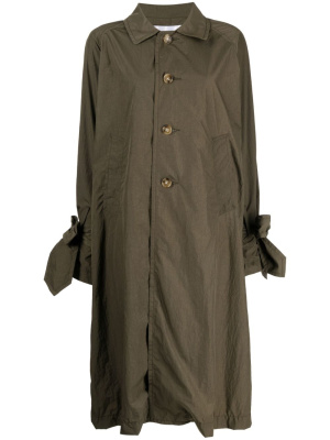 Tied-cuffs single-breasted trench, Comme des Garçons TAO Tied-cuffs single-breasted trench
Tied-cuffs single-breasted trench, Comme des Garçons TAO Tied-cuffs single-breasted trench