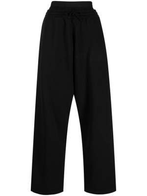 Elastic-waist wide-leg track pants, MM6 Maison Margiela Elastic-waist wide-leg track pants
Elastic-waist wide-leg track pants, MM6 Maison Margiela Elastic-waist wide-leg track pants