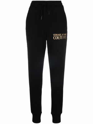 

Logo-print cotton track pants, Versace Jeans Couture Logo-print cotton track pants