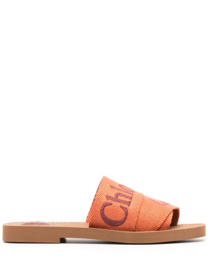 

Woody logo-embroidered flat mules, Chloé Woody logo-embroidered flat mules