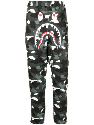 

Camouflage print trousers, A BATHING APE® Camouflage print trousers