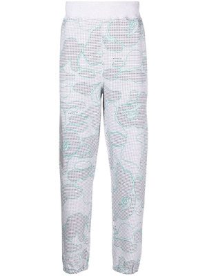 

Graphic logo-print track pants, A BATHING APE® Graphic logo-print track pants