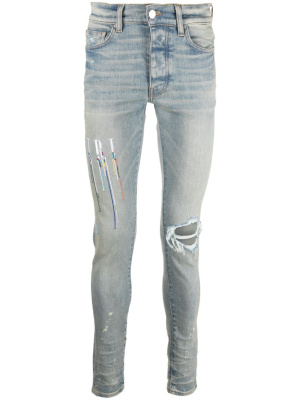 

Logo-embroidered skinny jeans, AMIRI Logo-embroidered skinny jeans