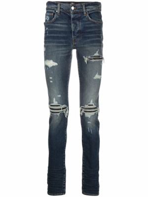 

Distressed skinny fit jeans, AMIRI Distressed skinny fit jeans