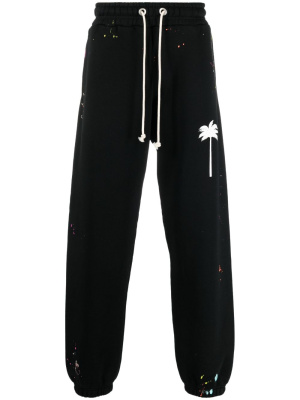 

Painted logo print track trousers, Palm Angels Painted logo print track trousers