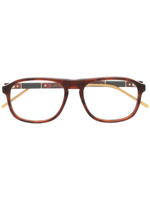 

Round frame tortoiseshell glasses, Gucci Eyewear Round frame tortoiseshell glasses