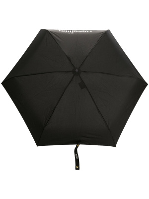 

Logo-print umbrella, Moschino Logo-print umbrella