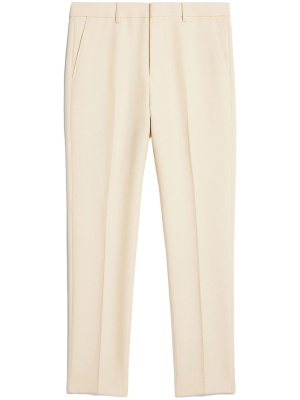 

Pressed-center cropped trousers, AMI Paris Pressed-center cropped trousers