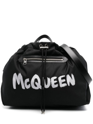 

Logo-print luggage bag, Alexander McQueen Logo-print luggage bag