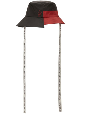 

Asymmetric colour-block bucket hat, JW Anderson Asymmetric colour-block bucket hat