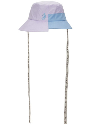 

Asymmetric colour-block bucket hat, JW Anderson Asymmetric colour-block bucket hat