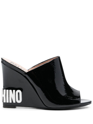 

Embossed-logo wedge mules, Moschino Embossed-logo wedge mules