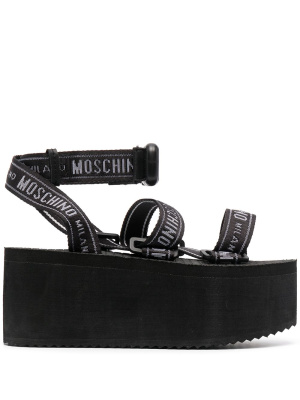 

Logo-strap flatform sandals, Moschino Logo-strap flatform sandals