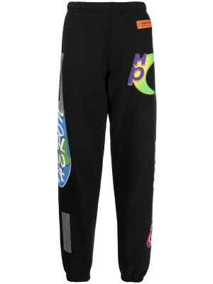

Collage print track pants, Heron Preston Collage print track pants