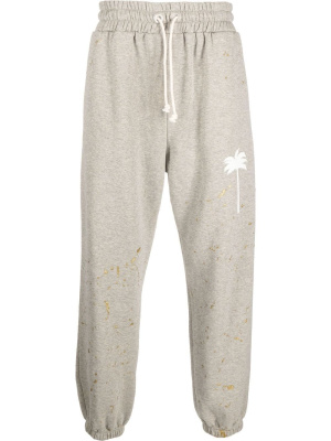 

Paint splatter track pants, Palm Angels Paint splatter track pants