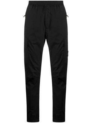 

Logo patch cargo trousers, Stone Island Logo patch cargo trousers