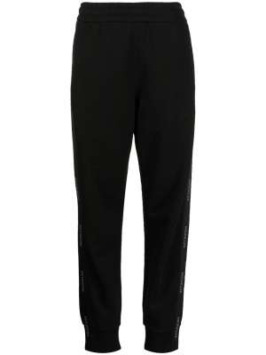 

Logo-tape cotton track pants, Moncler Logo-tape cotton track pants