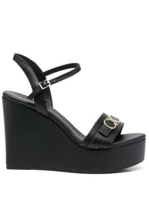 

Logo-lettering platform wedge sandals, Calvin Klein Logo-lettering platform wedge sandals