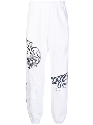 

Graphic-print track pants, Undercoverism Graphic-print track pants