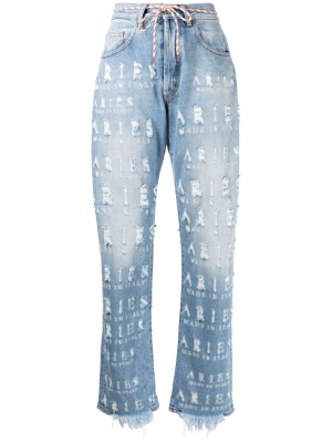 

Distressed logo-lettering jeans, Aries Distressed logo-lettering jeans