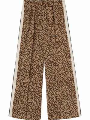 

Animalier-print cropped track pants, Palm Angels Animalier-print cropped track pants