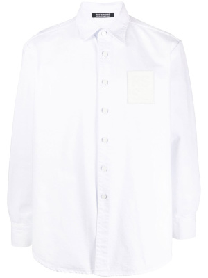 

Logo-patch denim overshirt, Raf Simons Logo-patch denim overshirt