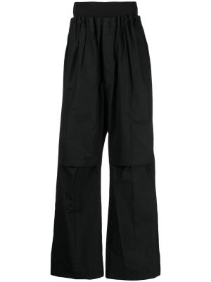 

Wide-leg flared trousers, Raf Simons Wide-leg flared trousers