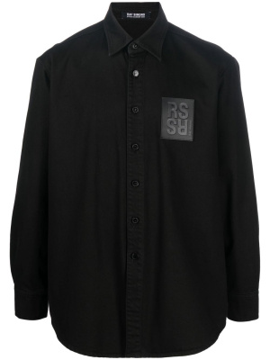 

Logo-patch denim overshirt, Raf Simons Logo-patch denim overshirt