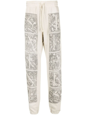 

Graphic-print cotton track pants, SAINT MXXXXXX Graphic-print cotton track pants