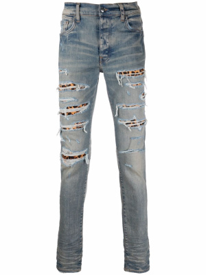 

Ripped-detail jeans, AMIRI Ripped-detail jeans