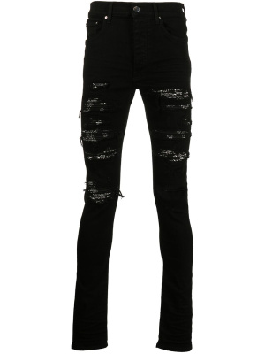 

Distressed-effect slim-fit jeans, AMIRI Distressed-effect slim-fit jeans