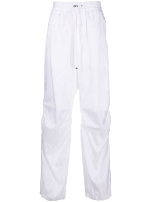 

Jacquard-logo printed trousers, AMIRI Jacquard-logo printed trousers