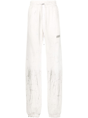

Cracked-print track pants, AMIRI Cracked-print track pants