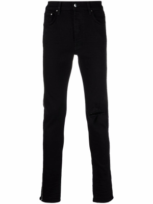 

Ripped-detail jeans, AMIRI Ripped-detail jeans