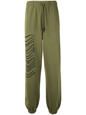 

Logo print track pants, Marcelo Burlon County of Milan Logo print track pants